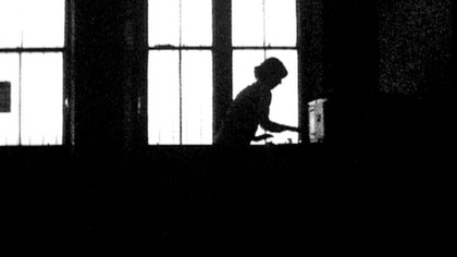 Half Life, still: Ms Szminka collates and files Mr Marker’s data